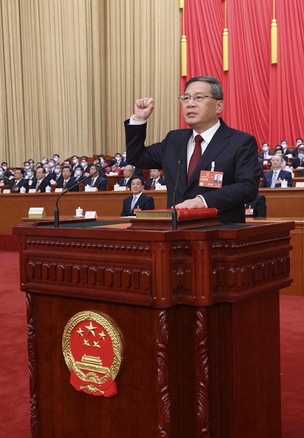 十四届全国人大一次会议举行第四次全体会议根据国家主席习近平的提名决定李强为国务院总理国家主席习近平签署主席令任命